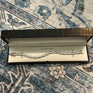 New in the box sterling silver heart shaped bracelet